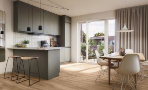 Küche mit Fensterfront, Tisch und Stühlen und Küchentresen