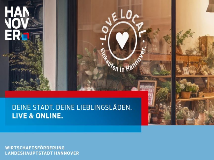 Schaufenster eines Blumenladens mit „Love Local – Einkaufen in Hannover"-Logo, Text: „Deine Stadt. Deine Lieblingsläden."