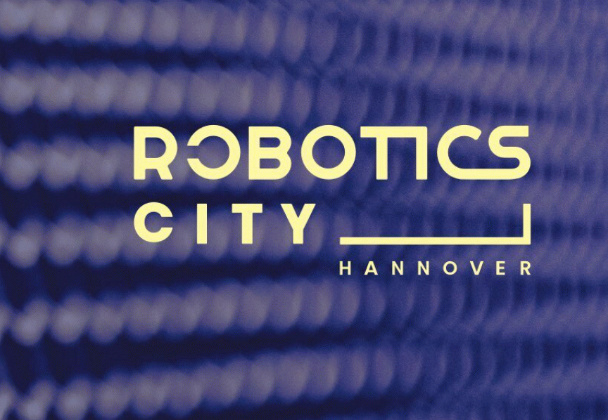 Logo „Robotics City Hannover" in Gelb auf blau-violettem Hintergrund mit Punktmuster.