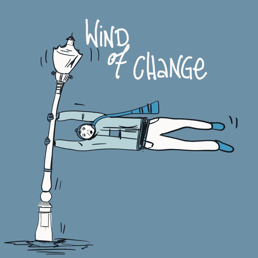 Wind of Change, ein Mann hängt an einer Laterne und wird weggeweht.